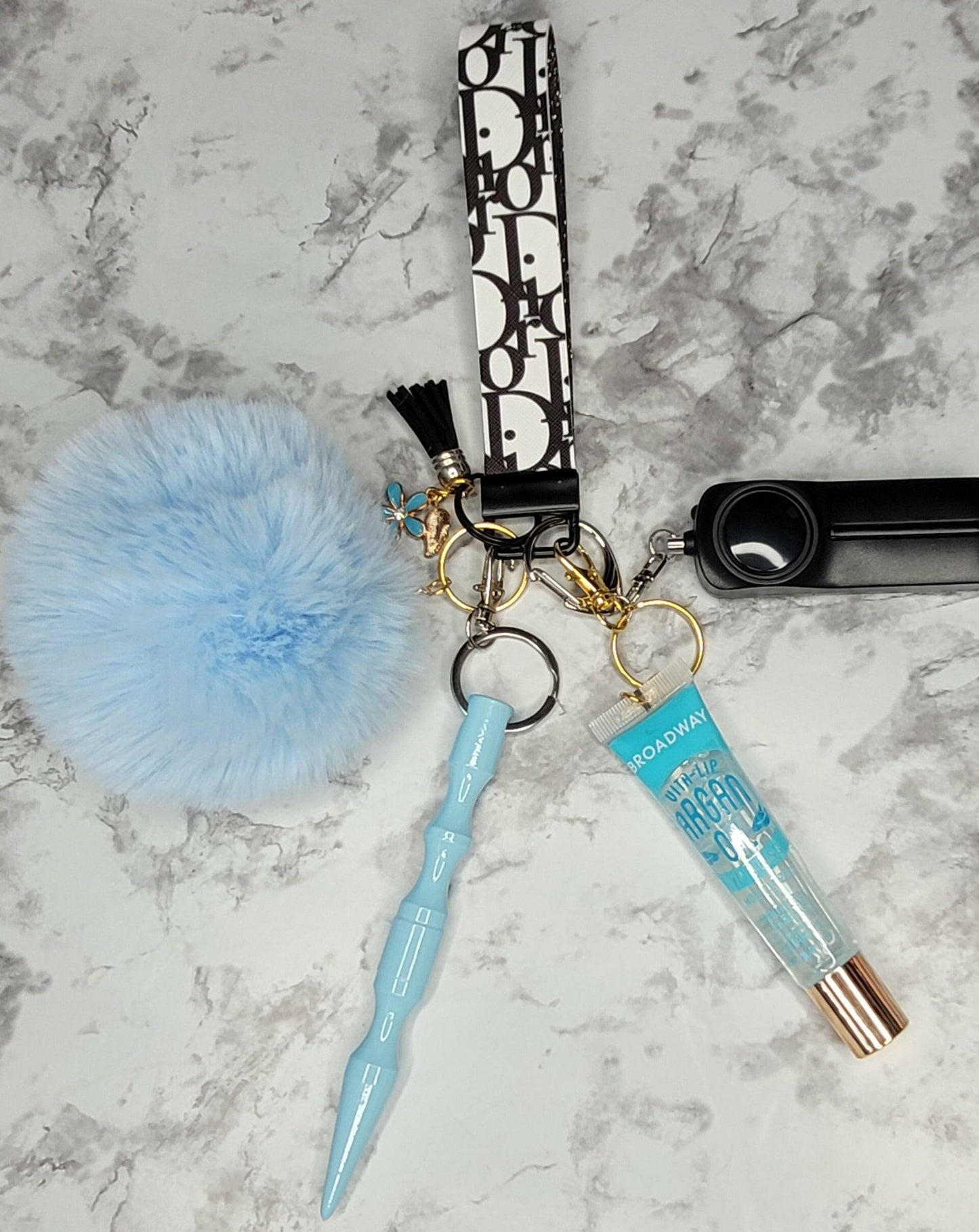 Black and White Faux Leather Wristlet Blue Pompom Self-Defense Keychain.