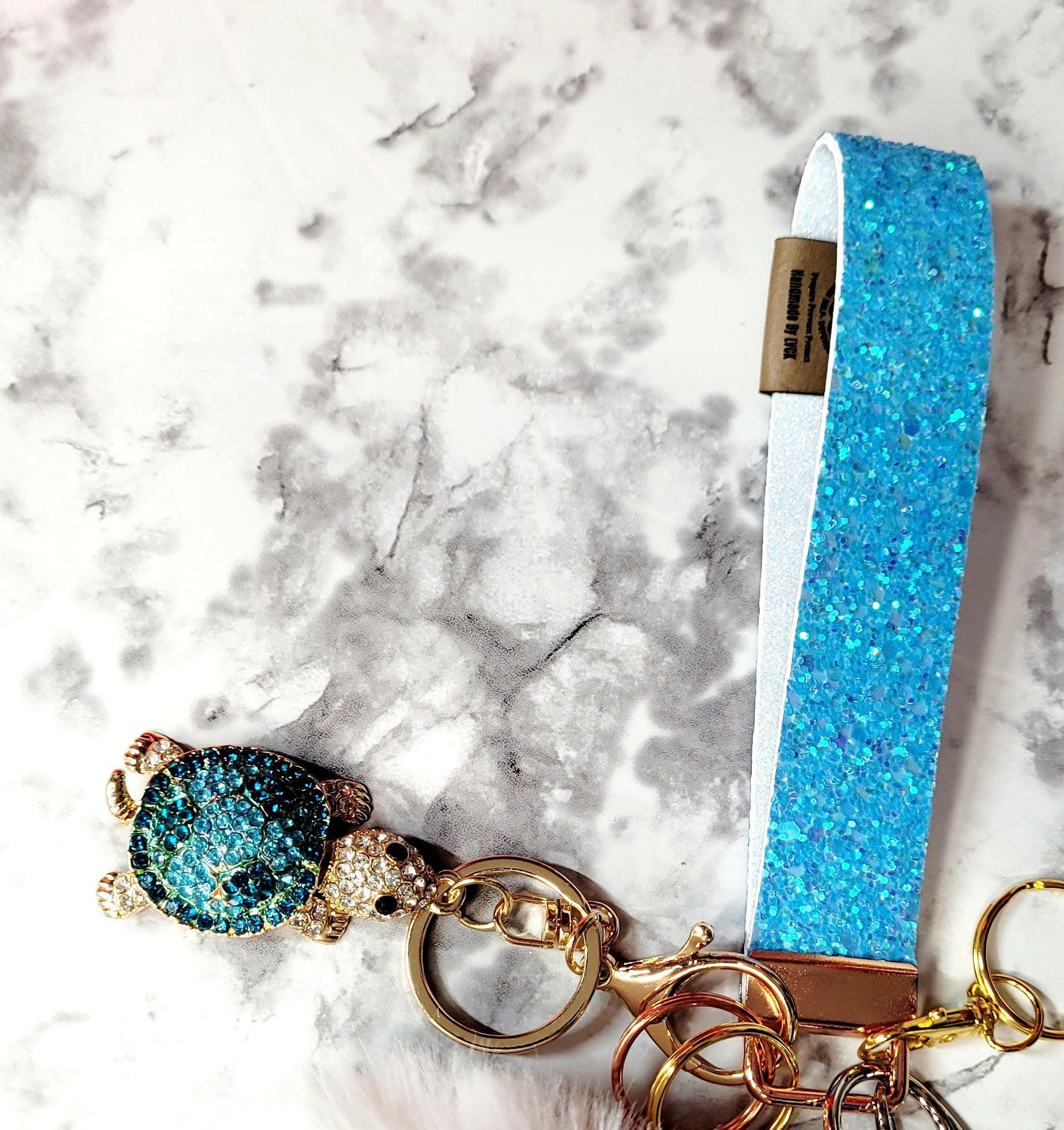 Sea Life Blue Sparkle Faux Leather Blue Crystal Sea Turtle Self-Defense Keychain.